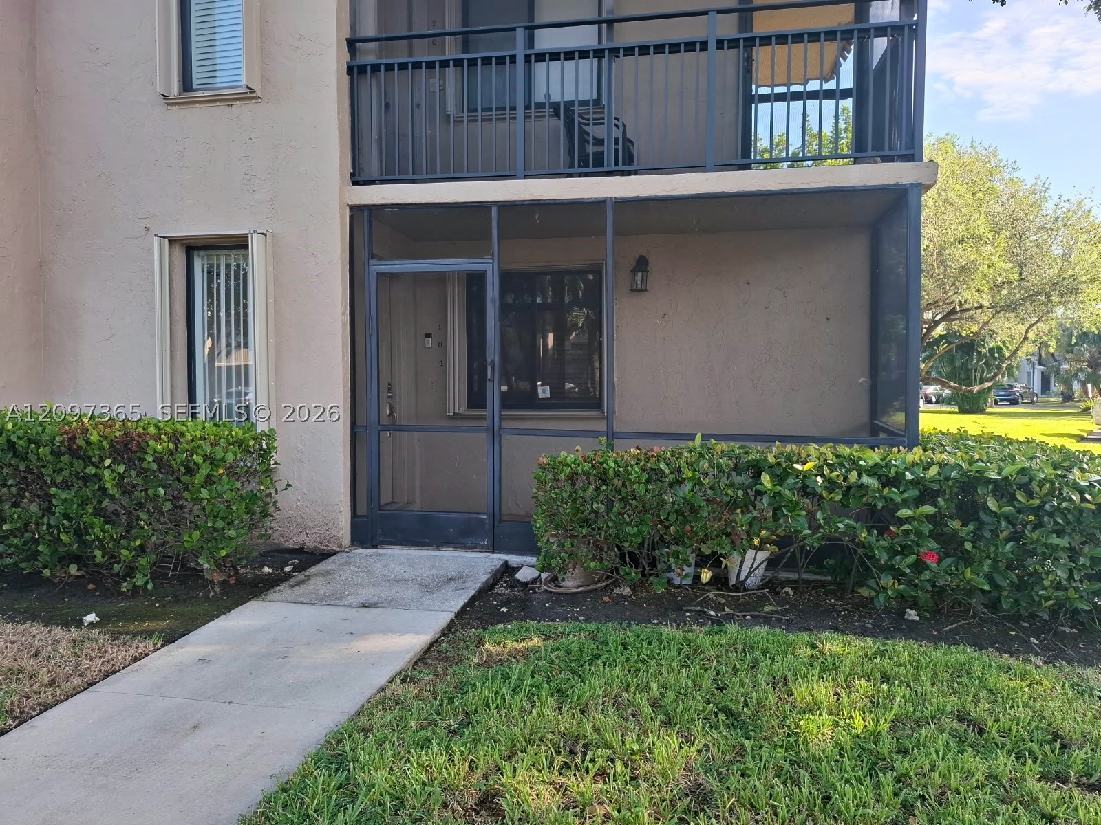 320 Racquet Club Rd #104, Weston FL 33326