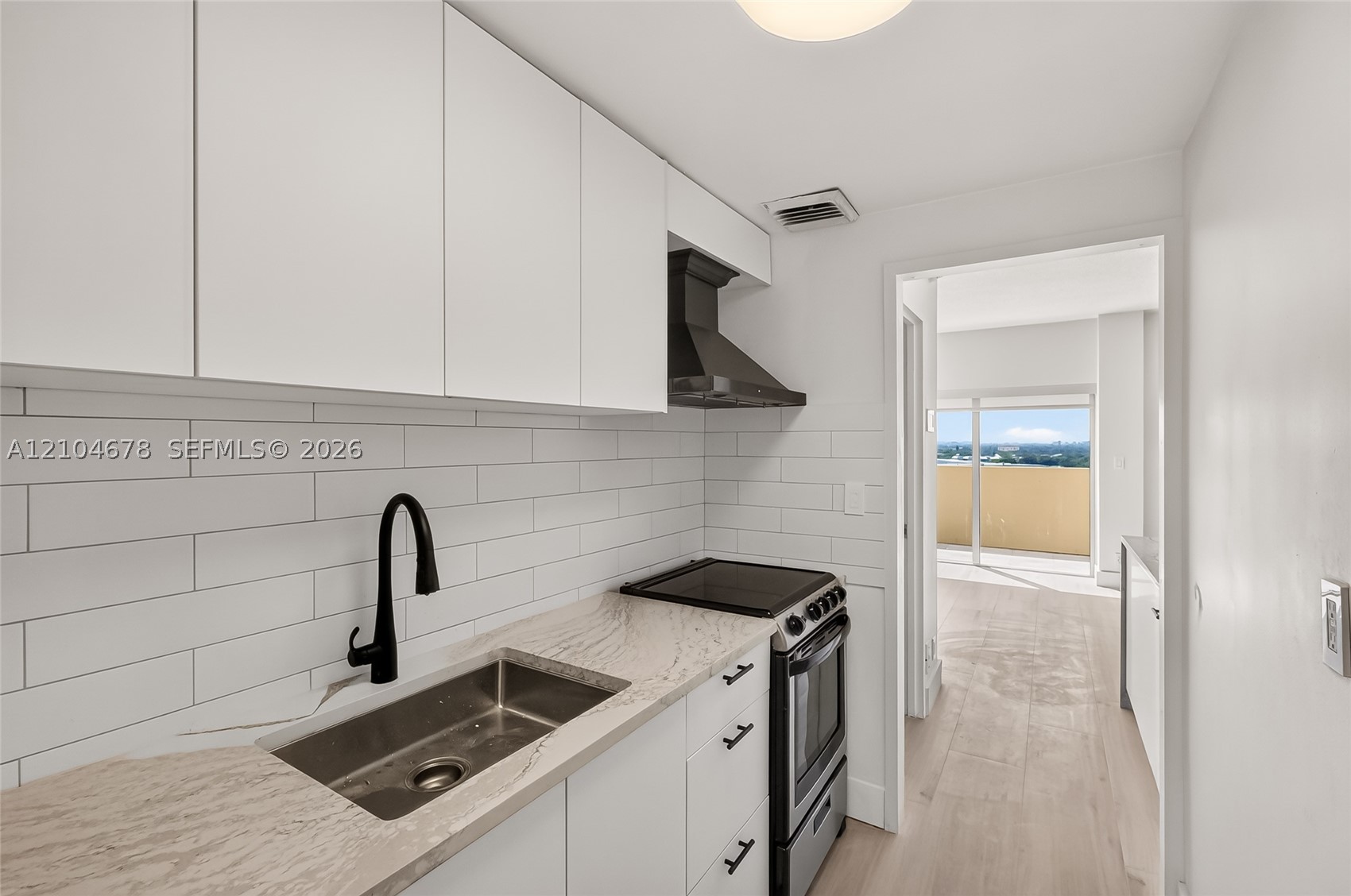 880 NE 69th St #14H, Miami FL 33138