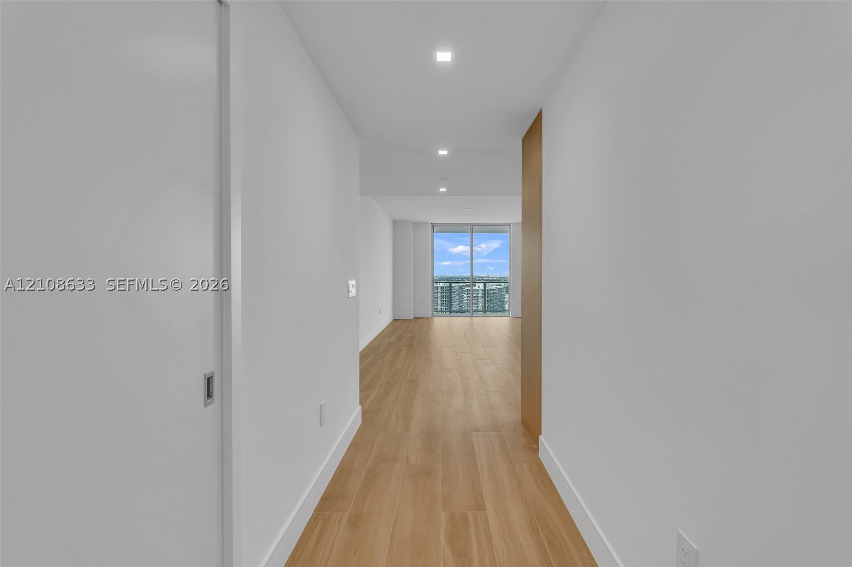 2411 Laguna Circle #2209+DEN, North Miami FL 33181