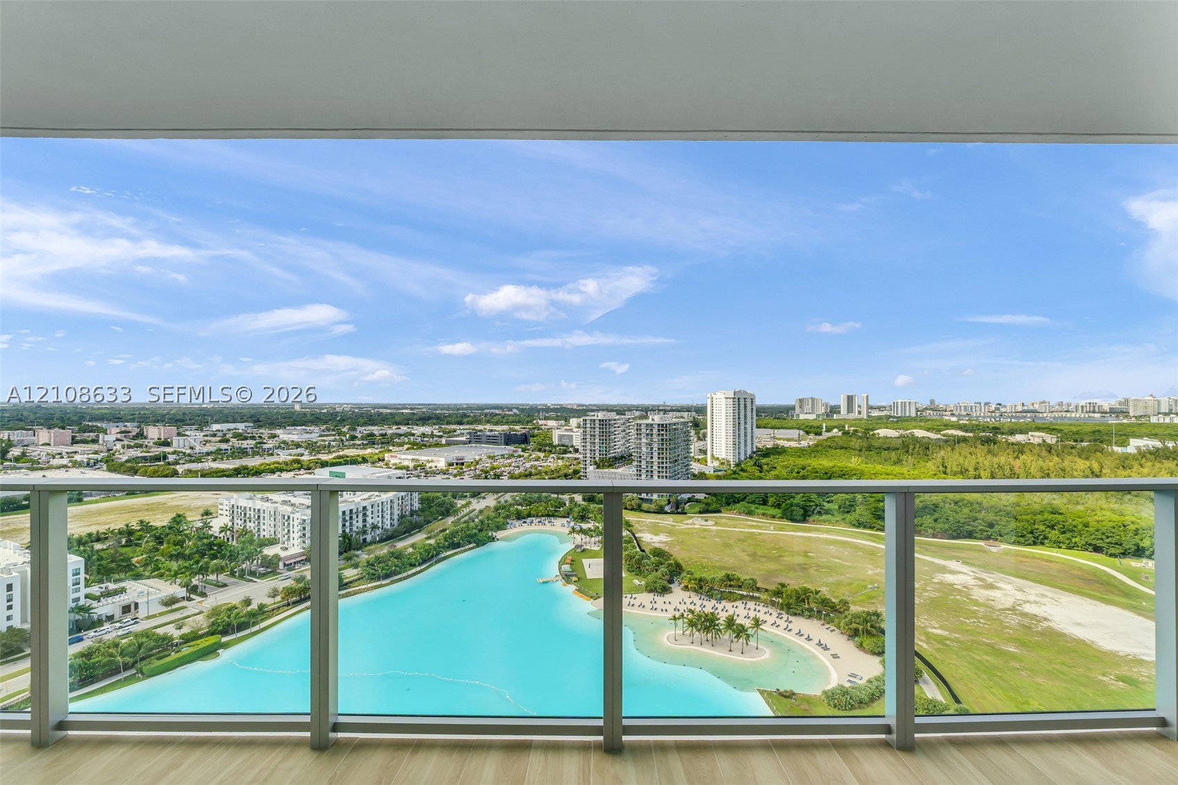 2411 Laguna Circle #2209+DEN, North Miami FL 33181