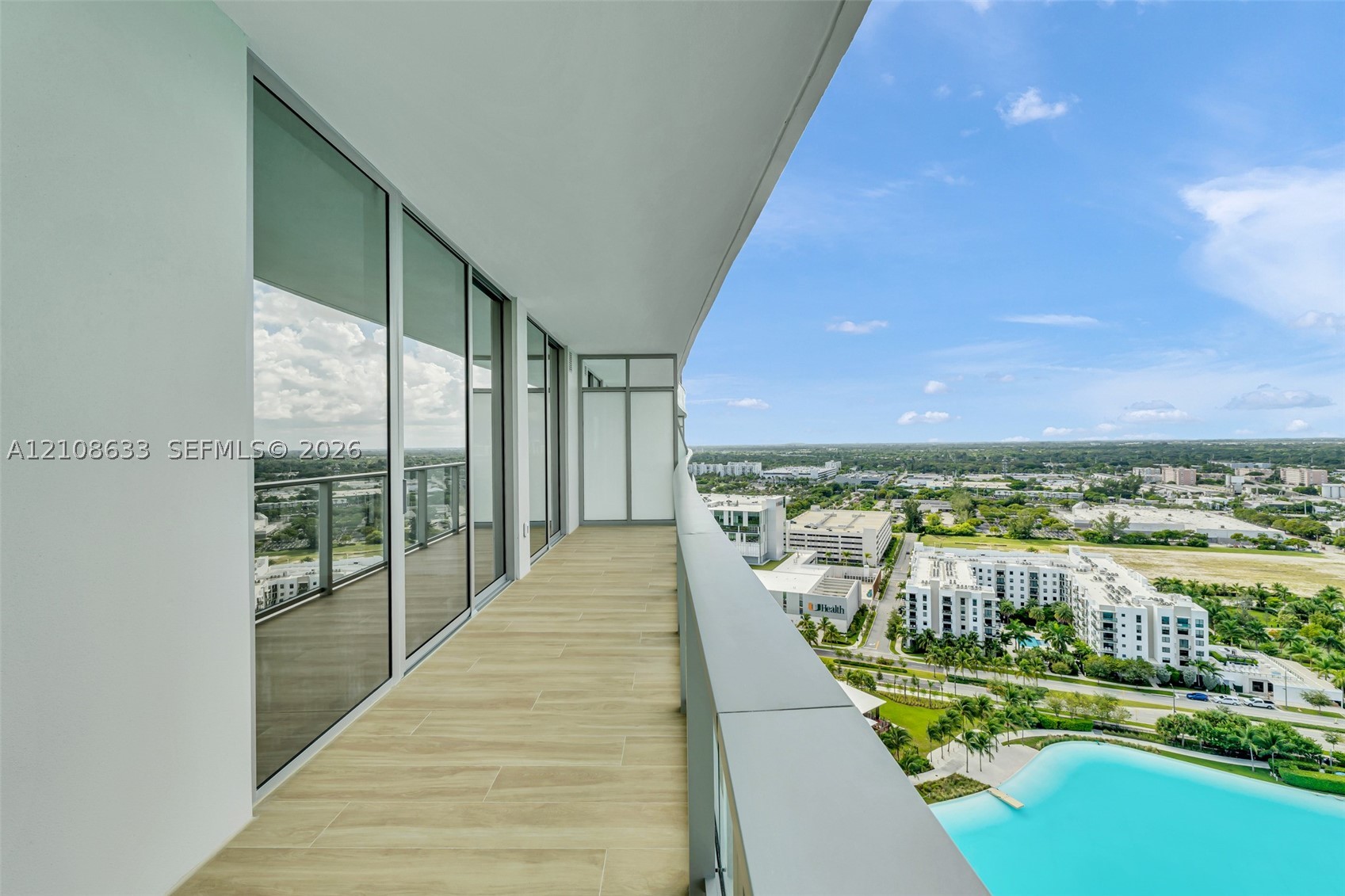 2411 Laguna Circle #2209+DEN, North Miami FL 33181