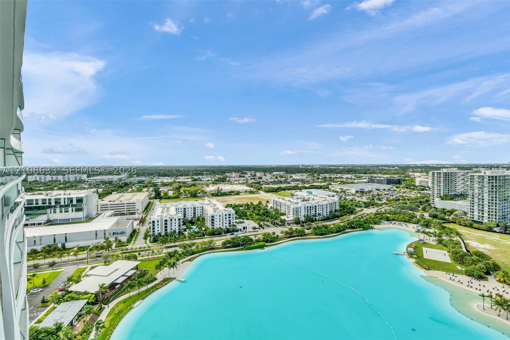 2411 Laguna Circle #2209+DEN, North Miami FL 33181