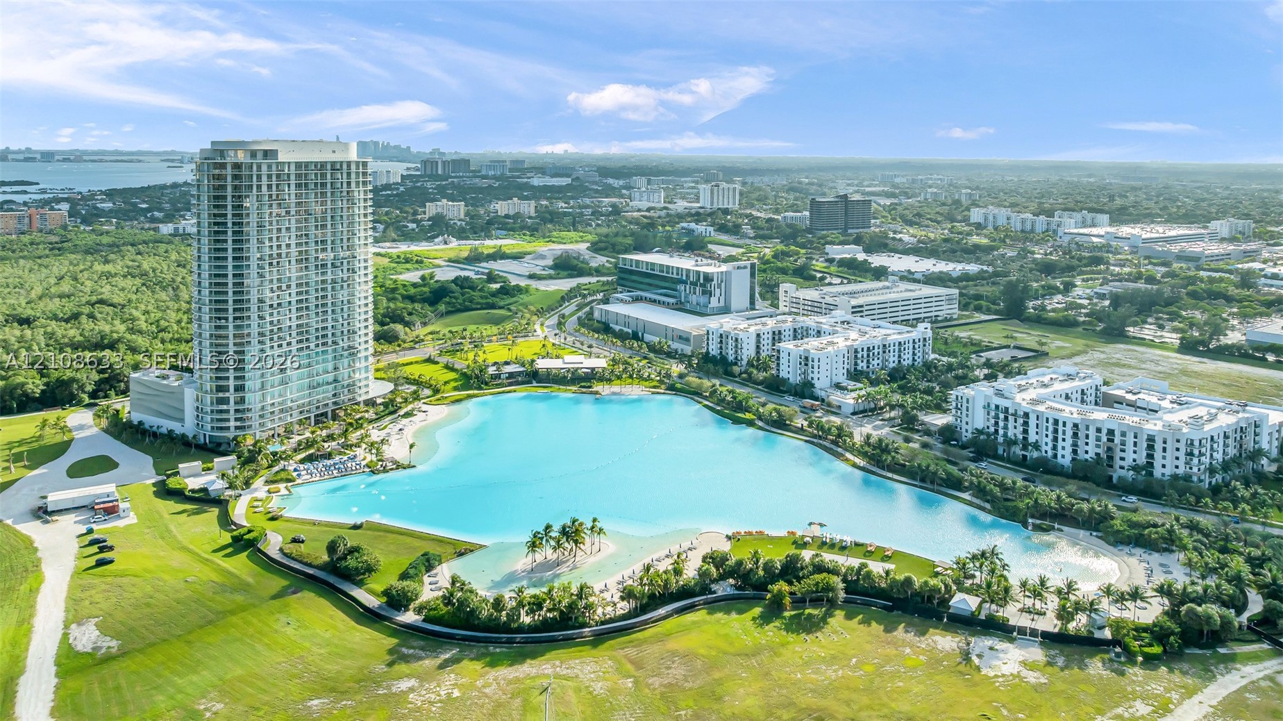 2411 Laguna Circle #2209+DEN, North Miami FL 33181