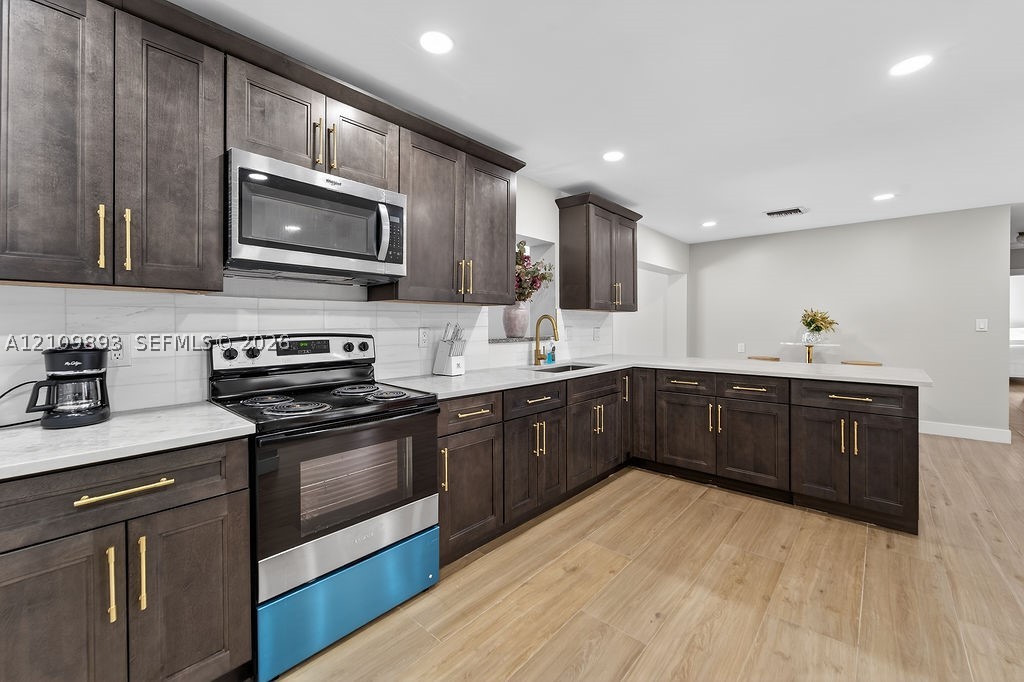 712 Tradewind Dr, North Palm Beach FL 33408