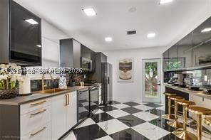 919 NW 49th St, Miami FL 33127