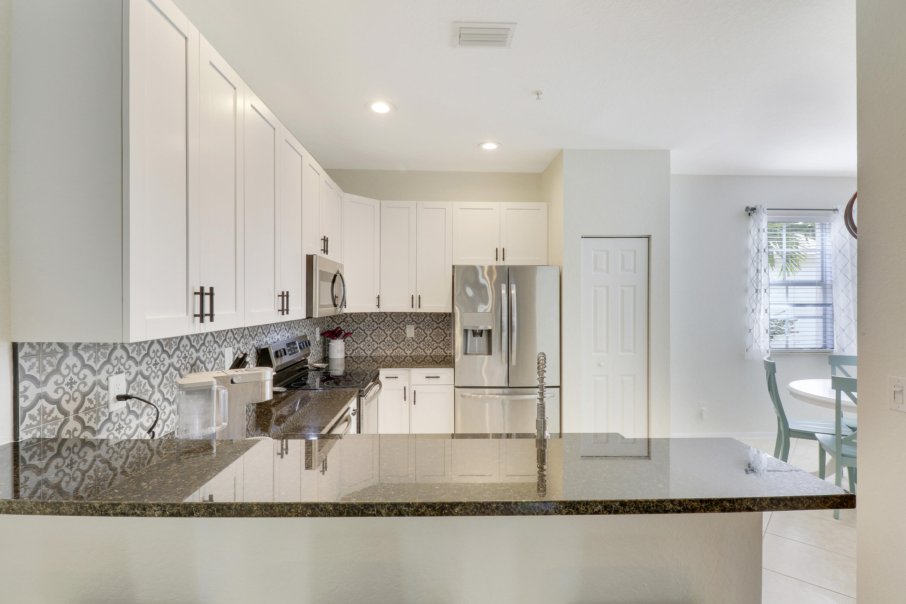 123 E Thatch Palm, Jupiter FL 33458