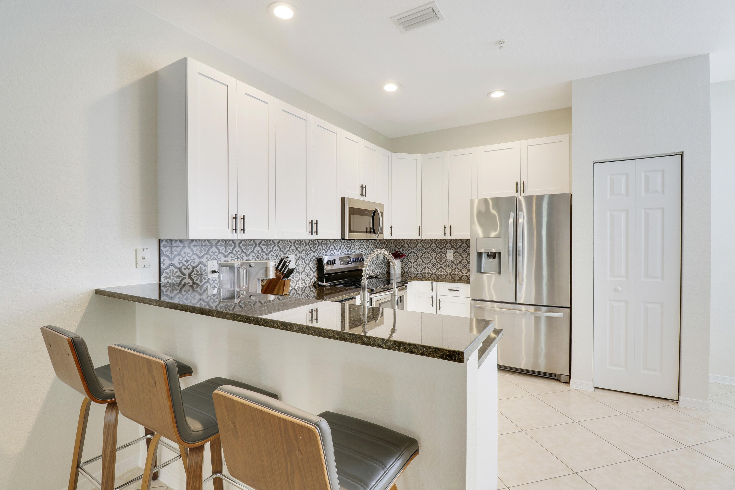 123 E Thatch Palm, Jupiter FL 33458