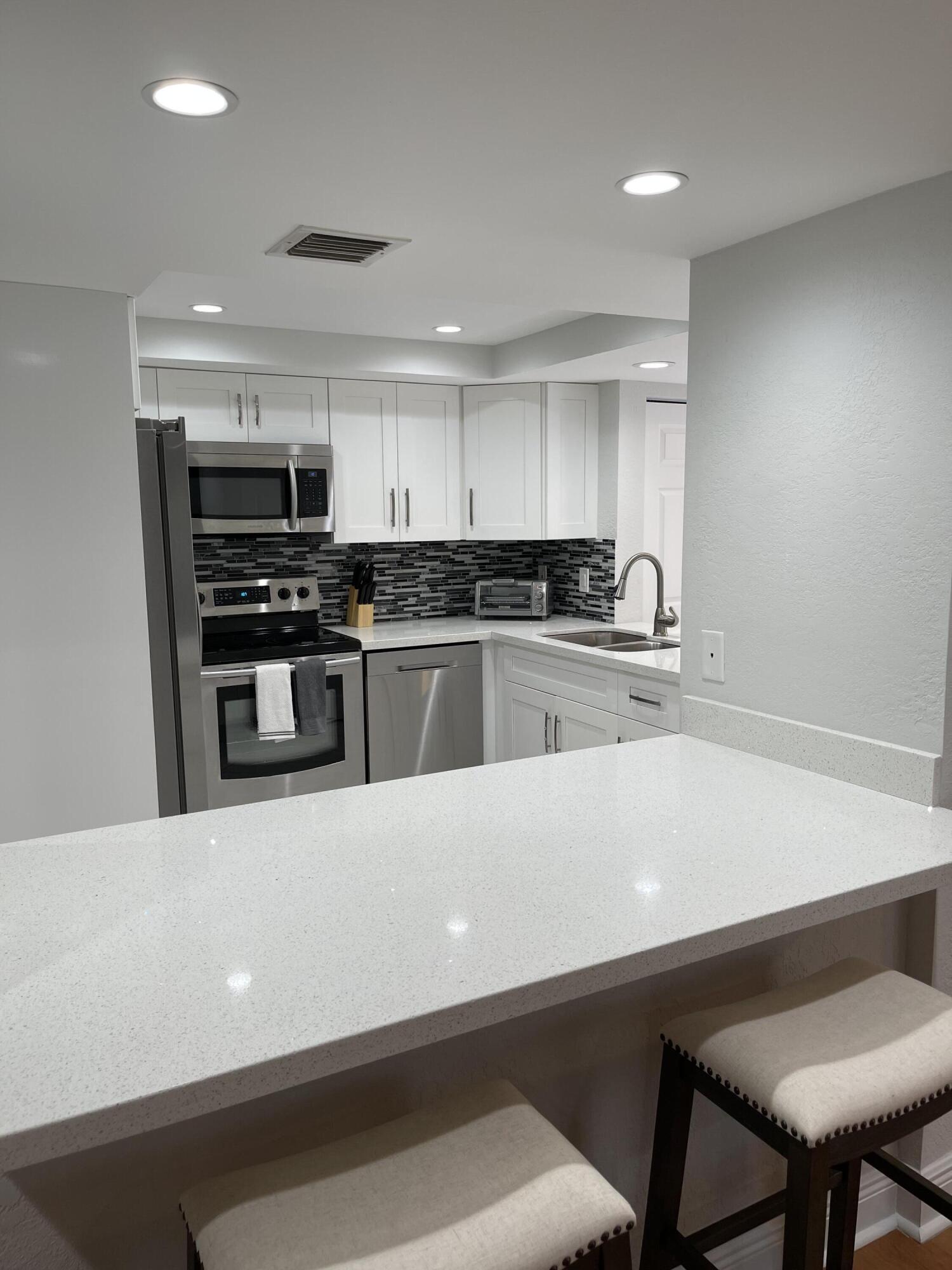 1660 Twelve Oaks #203, North Palm Beach FL 33408