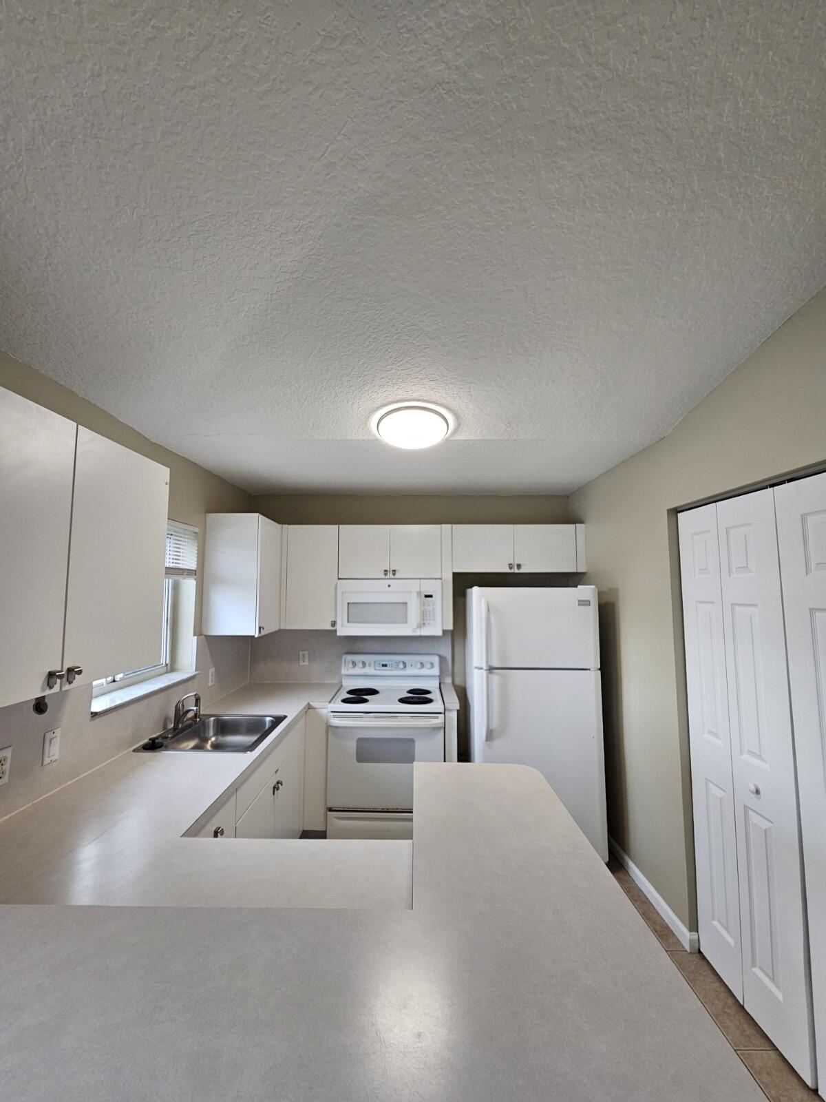 3490 Briar Bay #206, West Palm Beach FL 33411