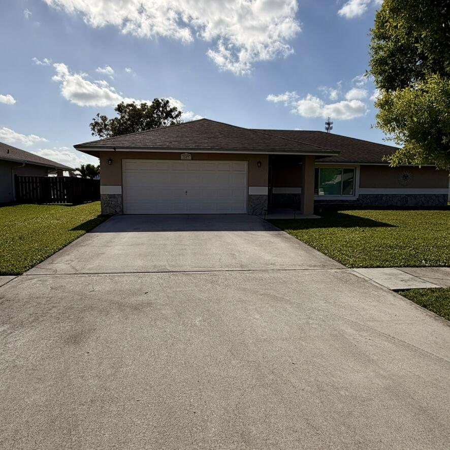 147 Sunflower, Royal Palm Beach FL 33411