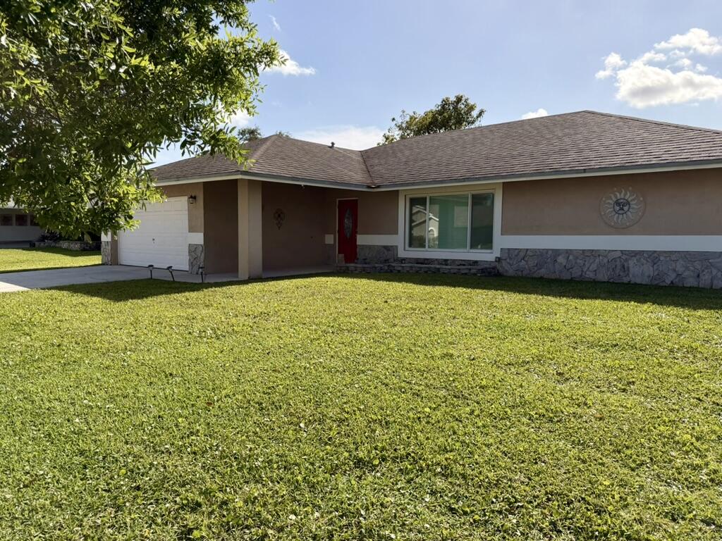 147 Sunflower, Royal Palm Beach FL 33411