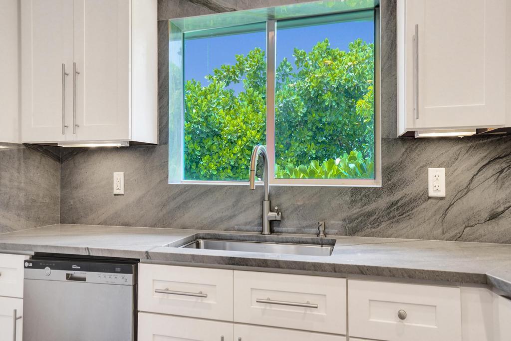 5 Gatehouse, Sea Ranch Lakes FL 33308
