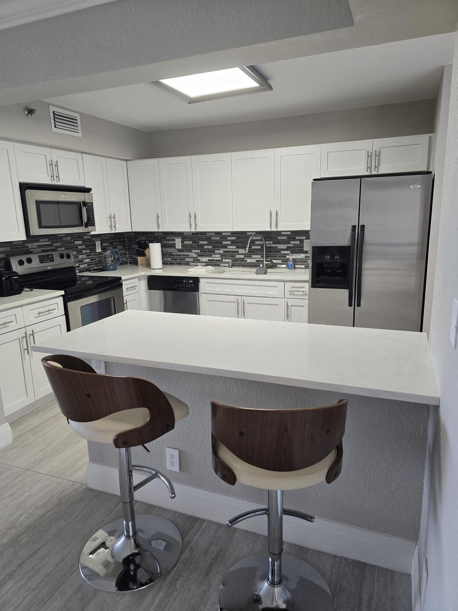 7580 Regency Lake #402, Boca Raton FL 33433
