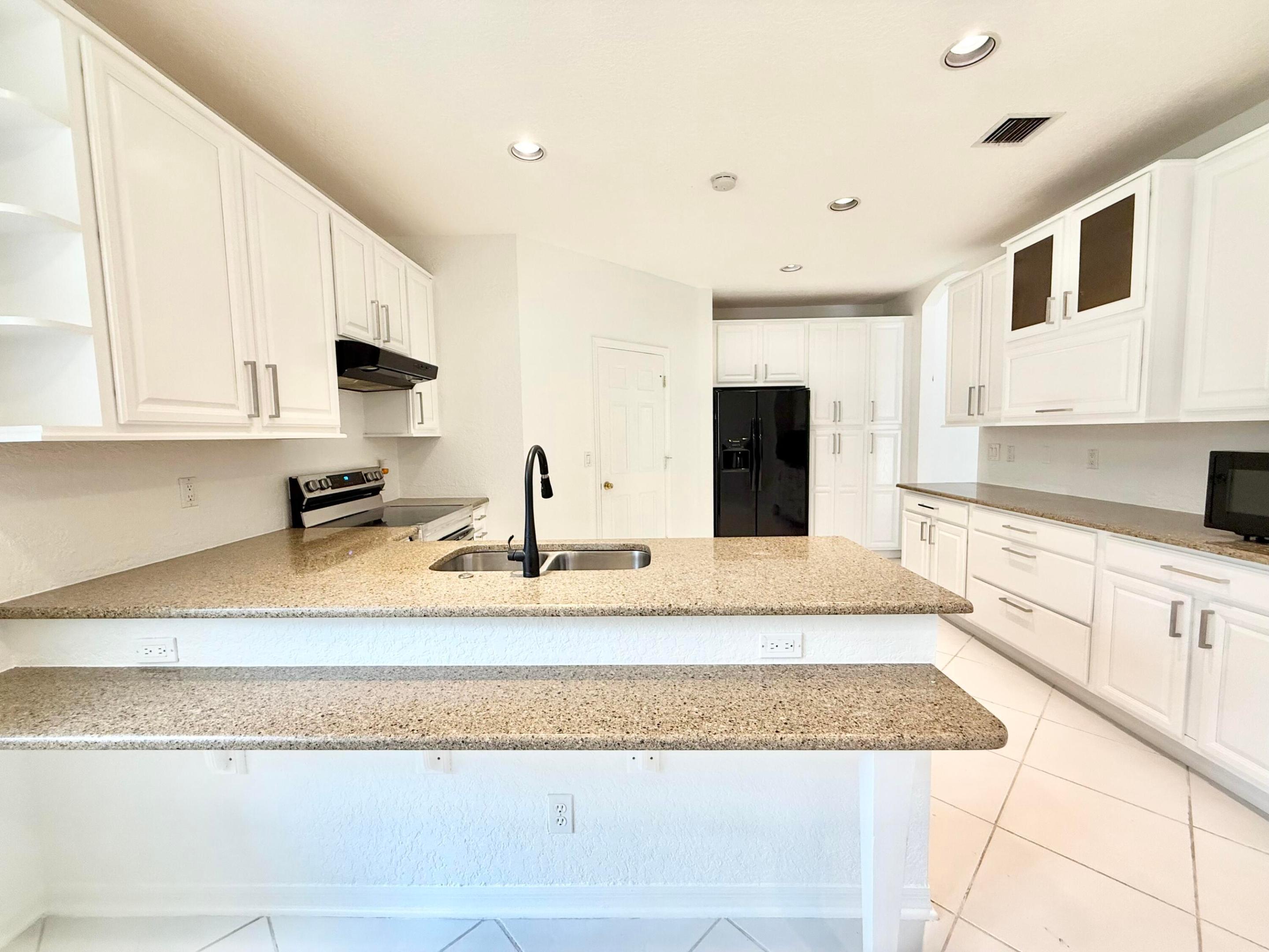 12310 Riverfalls, Boca Raton FL 33428