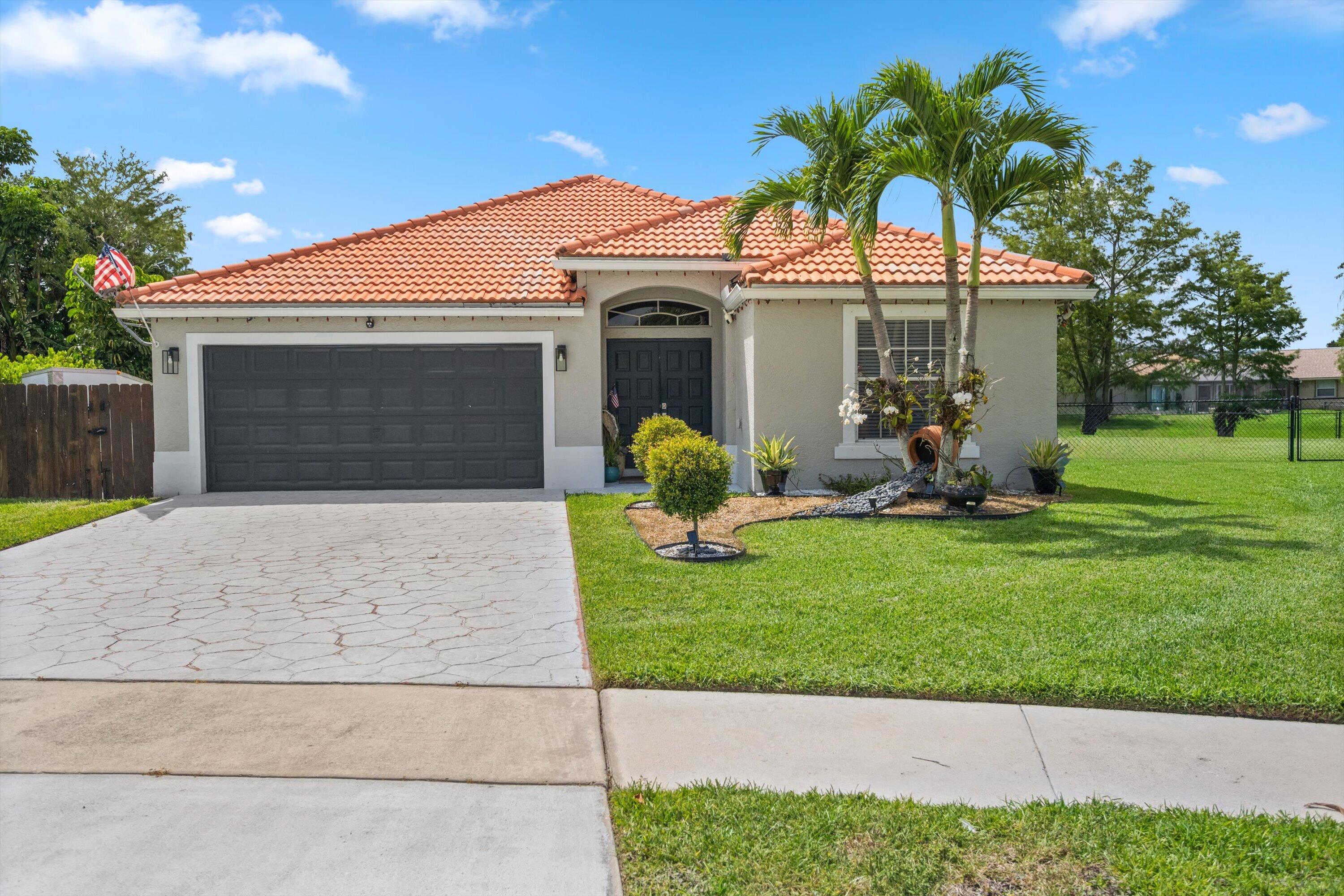 133 Nottingham, Royal Palm Beach FL 33411