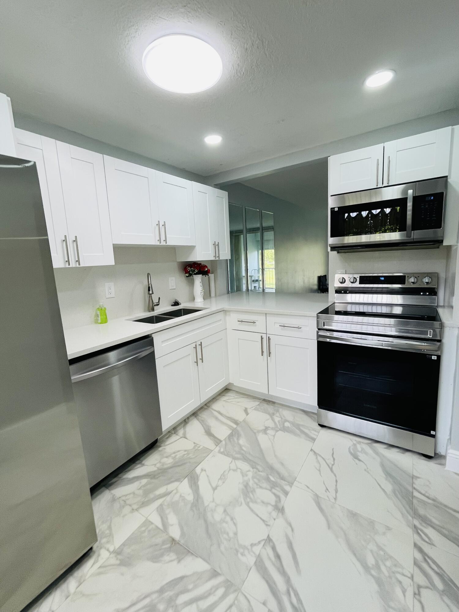 5980 NW 64TH #203, Tamarac FL 33319