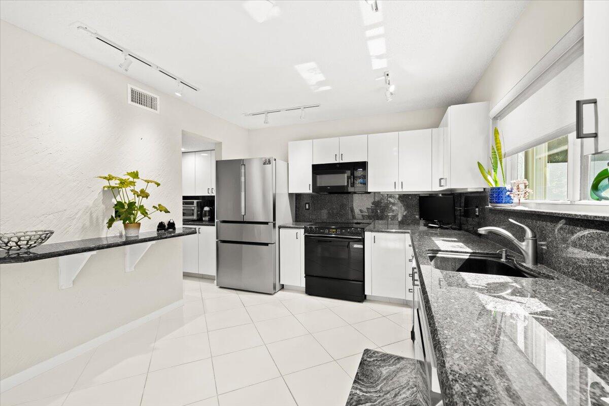 7338 Woodmont, Boca Raton FL 33434