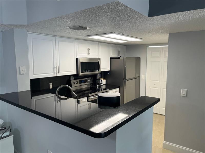 5051 WILES #207, Coconut Creek FL 33073
