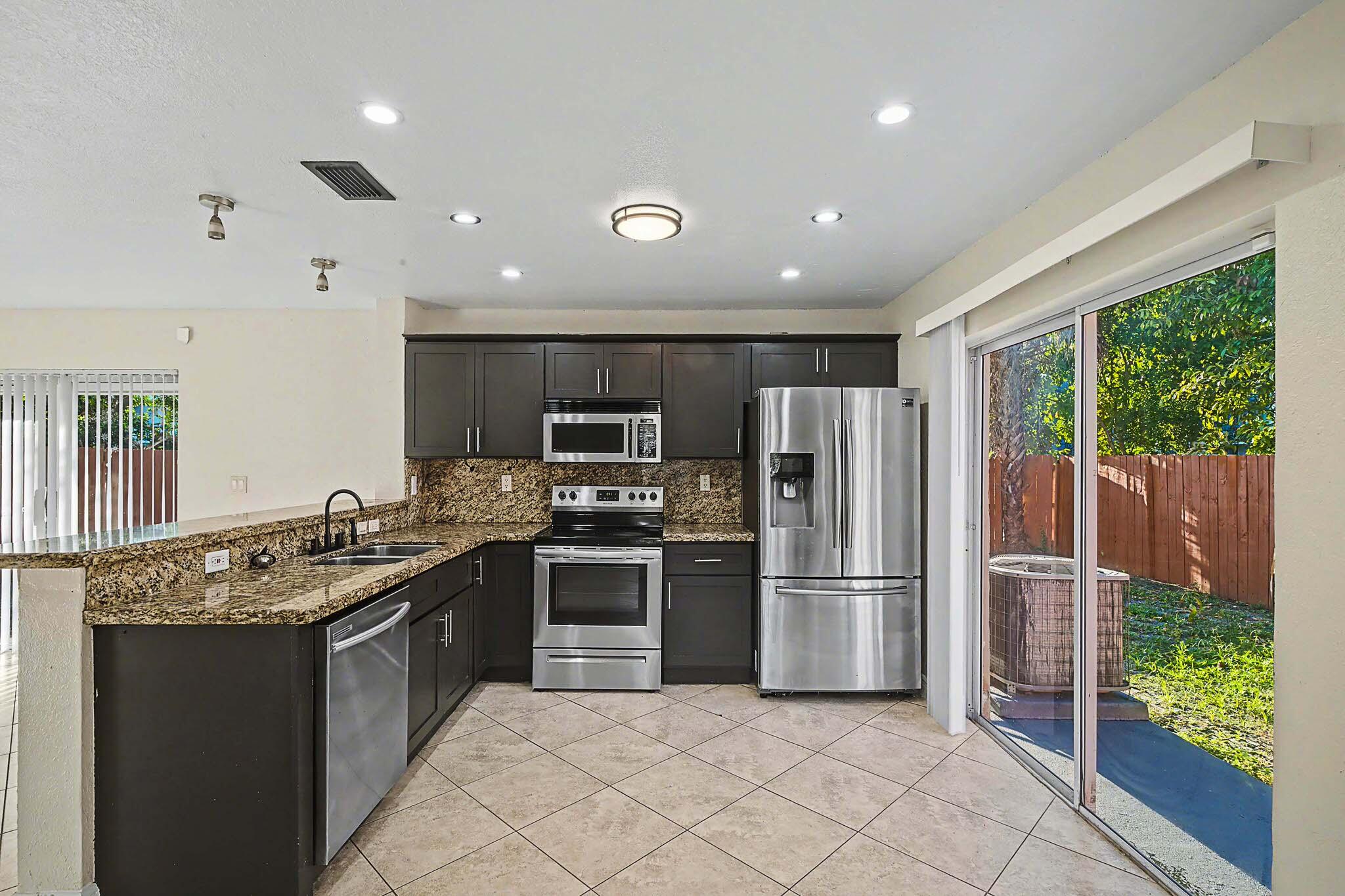 5789 WOODLAND POINT, Tamarac FL 33319