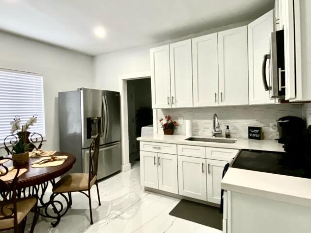 55 NW 47th, Miami FL 33127