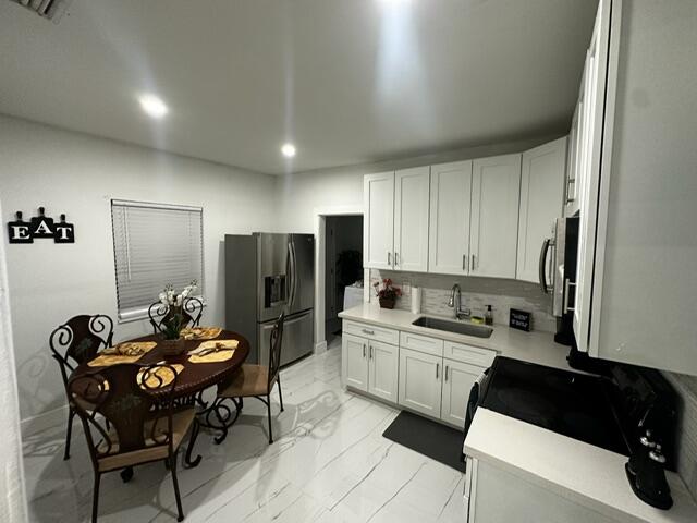 55 NW 47th, Miami FL 33127