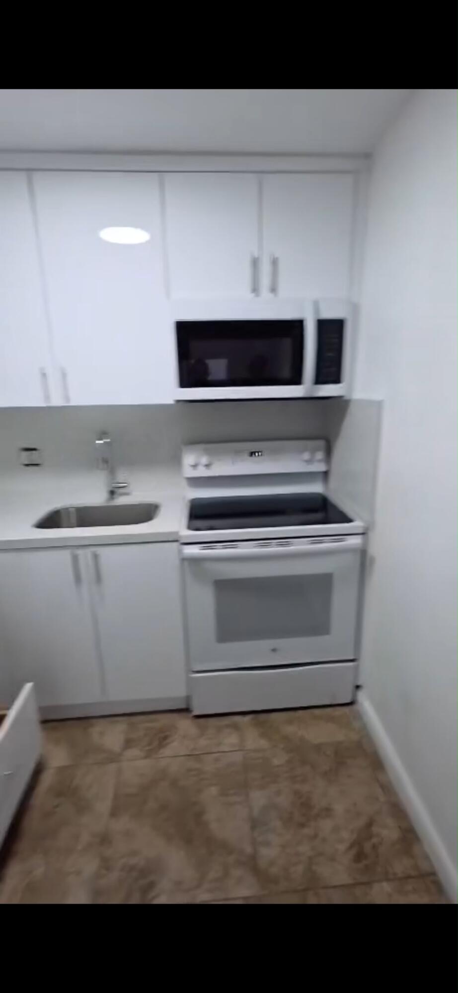 3640 NW 9TH #306, Miami FL 33125