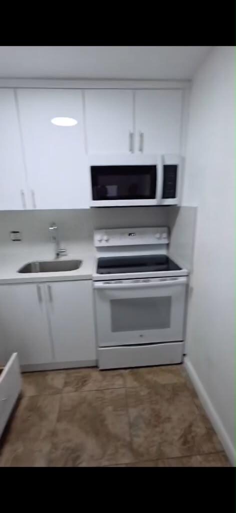 3640 NW 9TH #306, Miami FL 33125