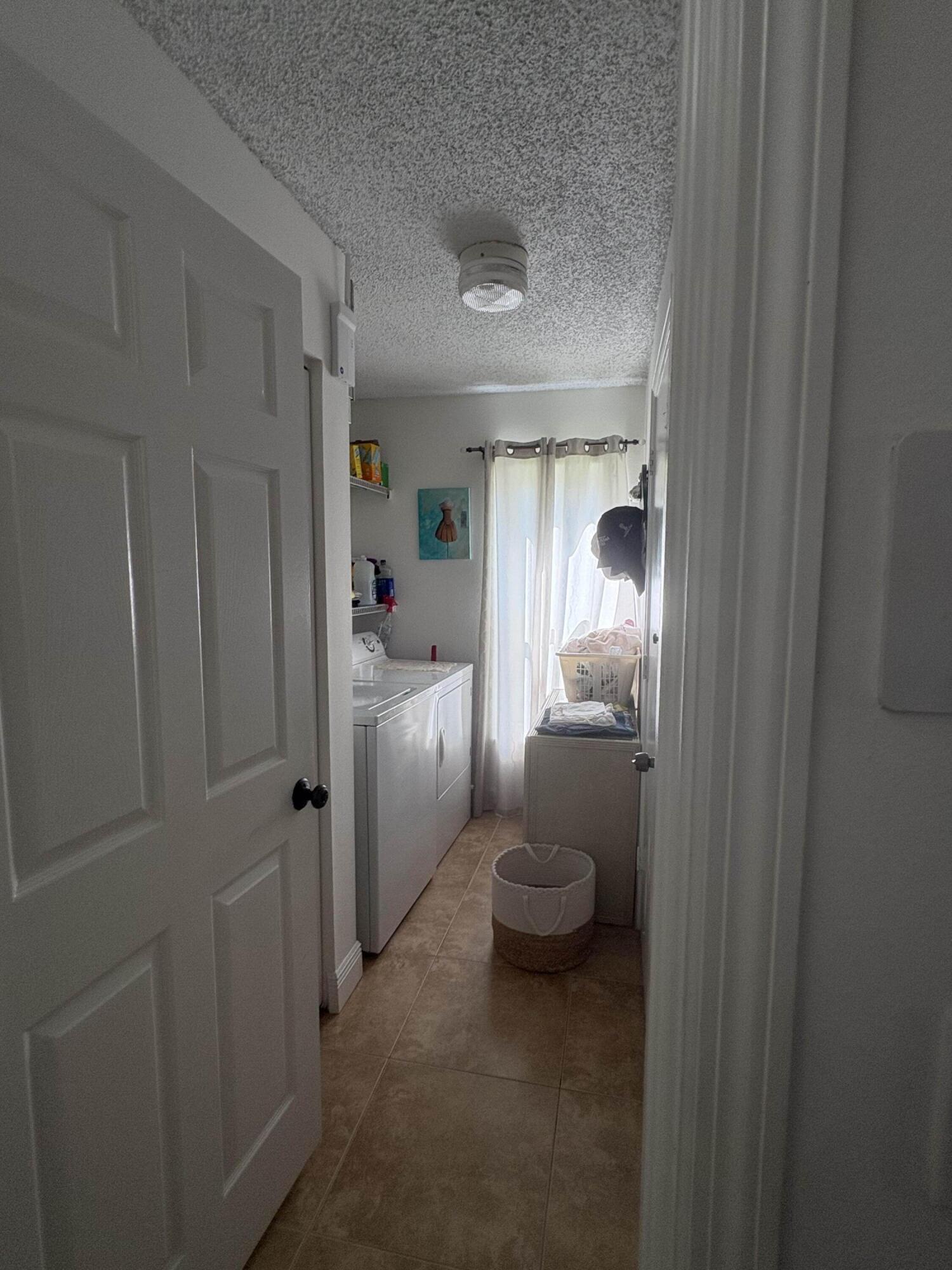 1604 Rosewood, Palm Beach Gardens FL 33418
