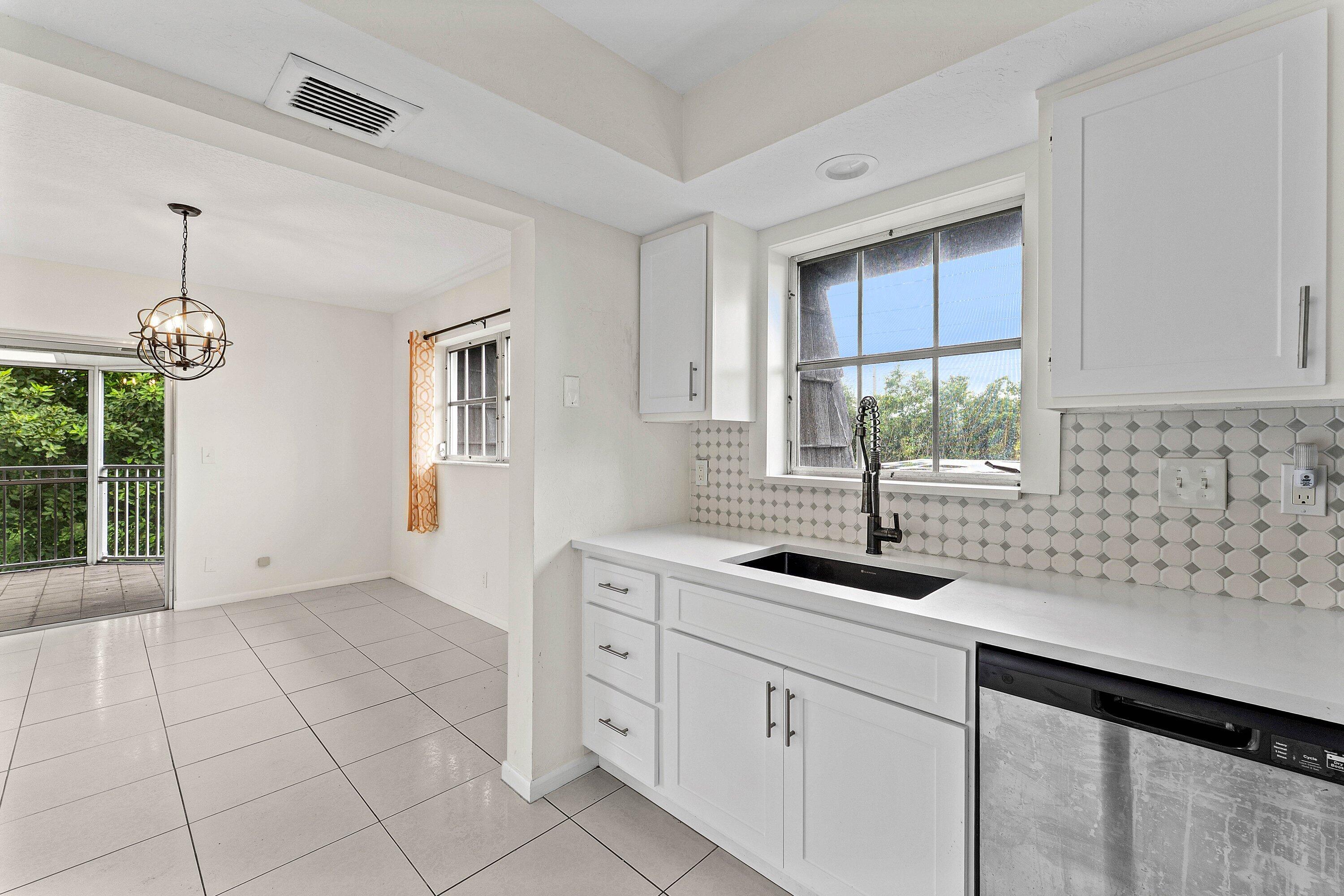 408 PINE TREE #12, Atlantis FL 33462