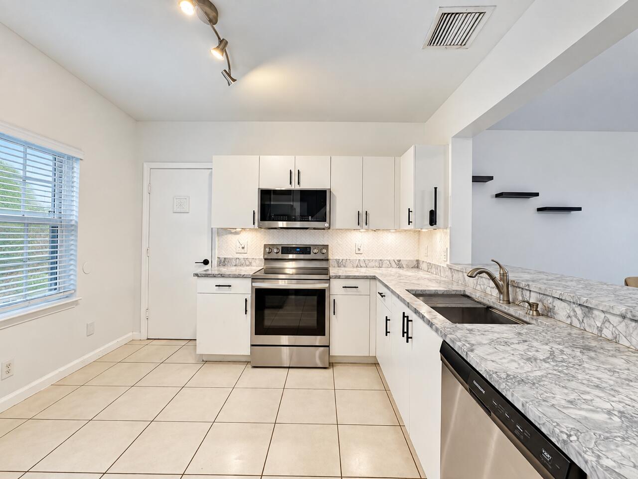 9491 Stanley, Tamarac FL 33321