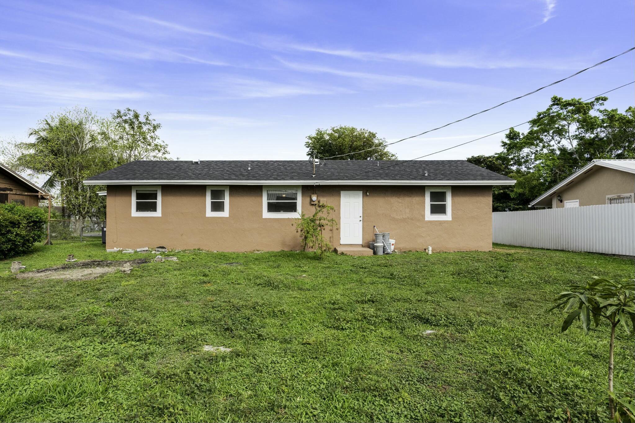 816 NE 22ND, Belle Glade FL 33430