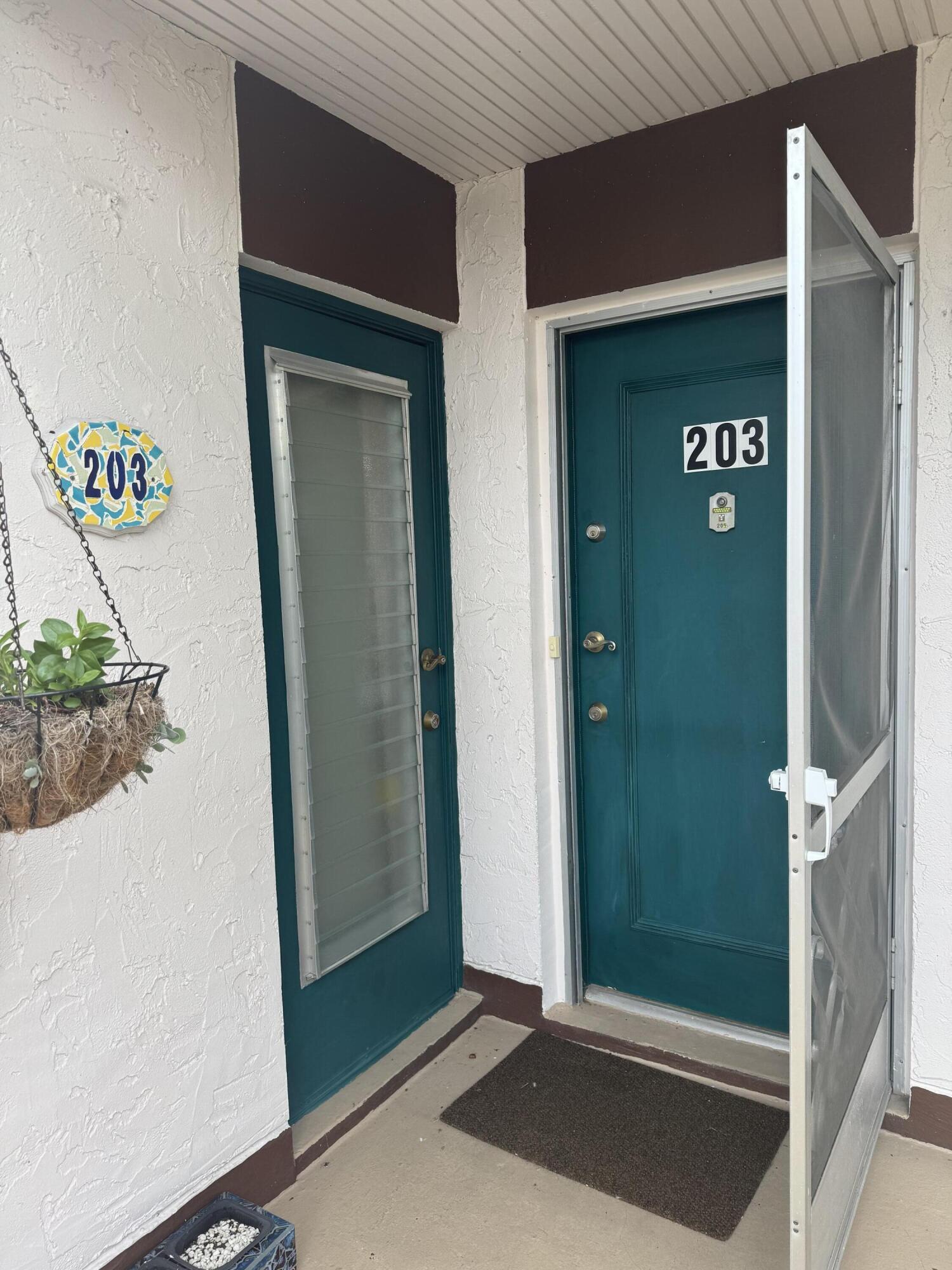 4 Greenway Village #203, Royal Palm Beach FL 33411