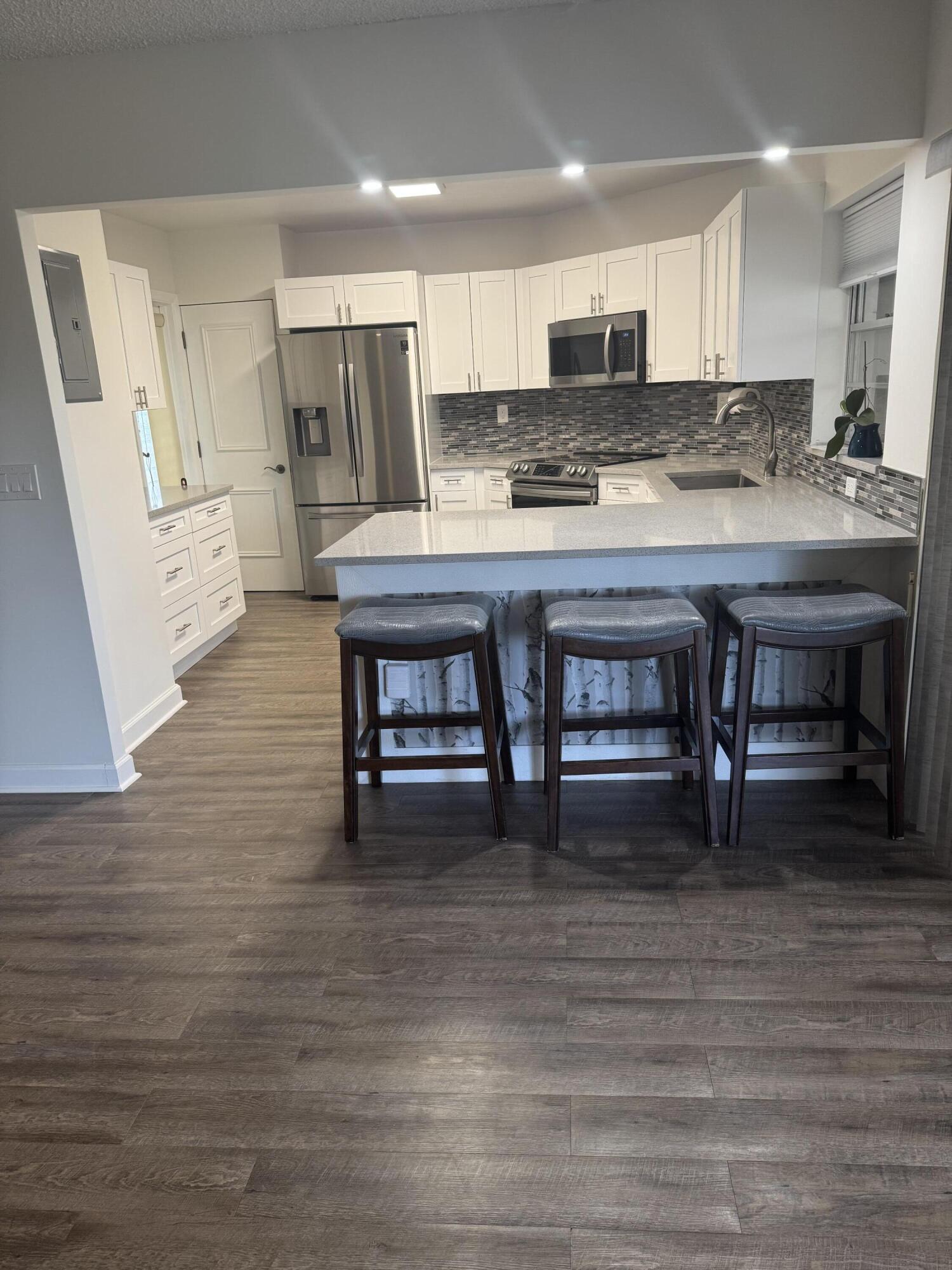 4 Greenway Village #203, Royal Palm Beach FL 33411