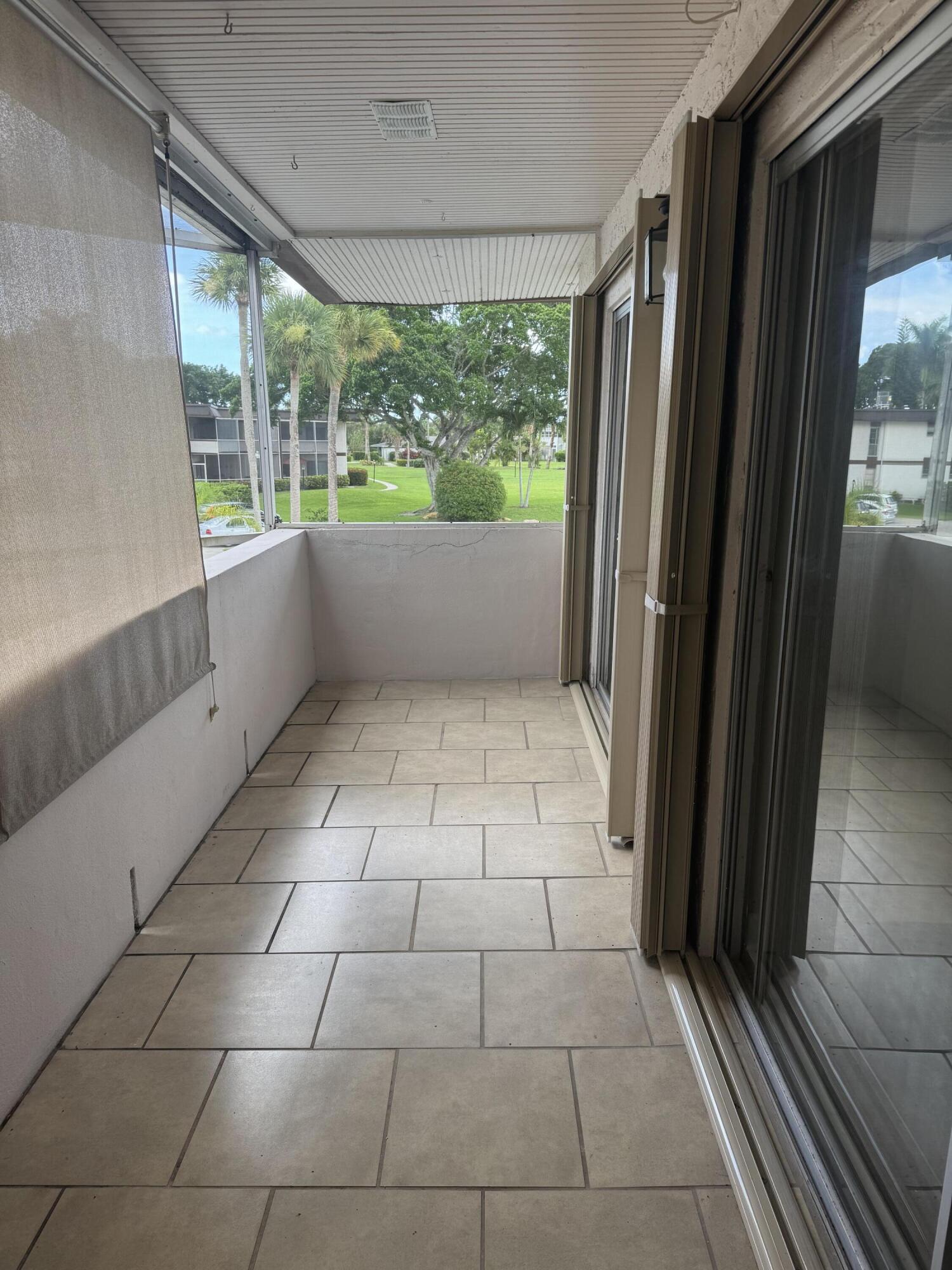 4 Greenway Village #203, Royal Palm Beach FL 33411