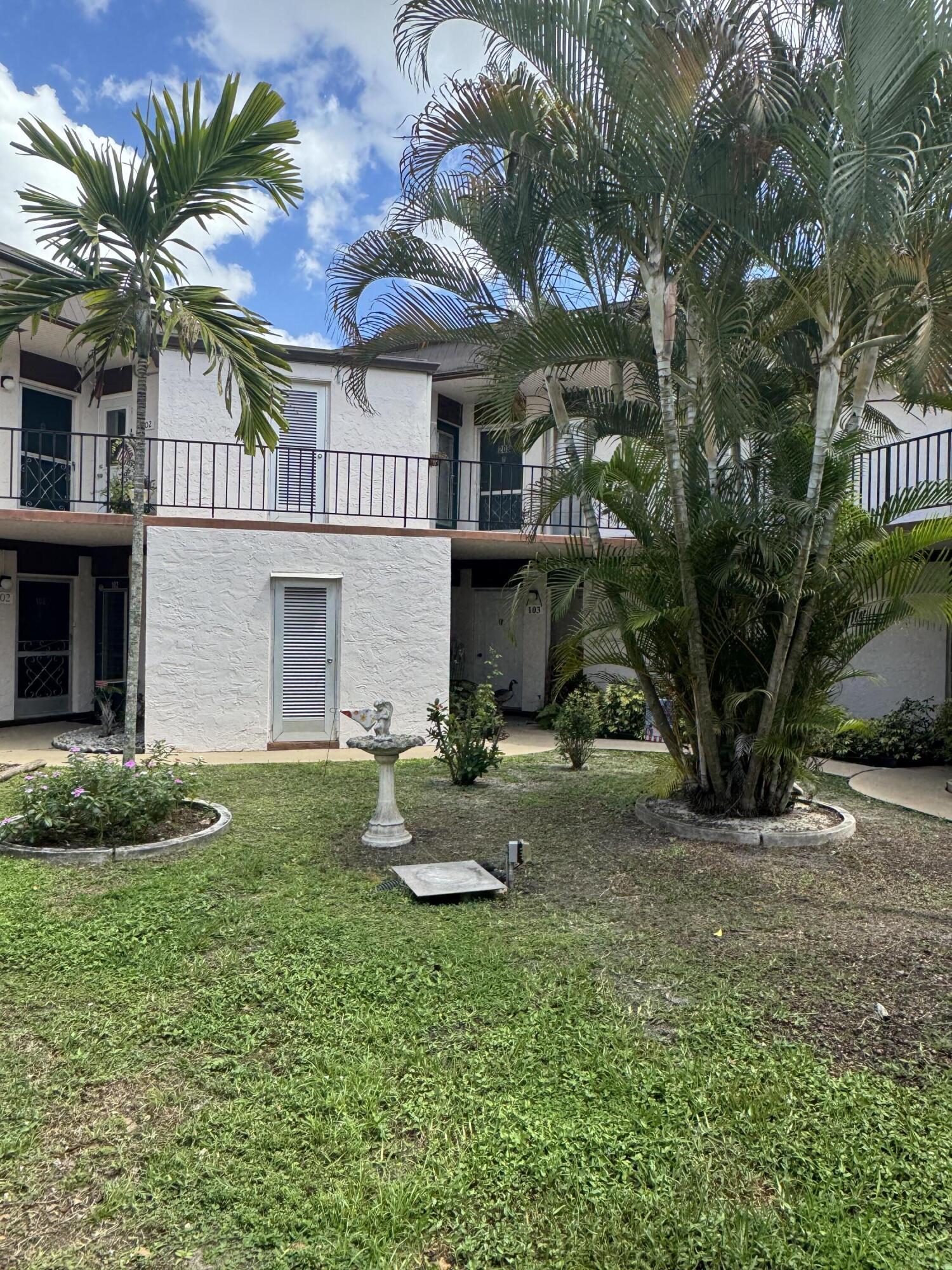 4 Greenway Village #203, Royal Palm Beach FL 33411