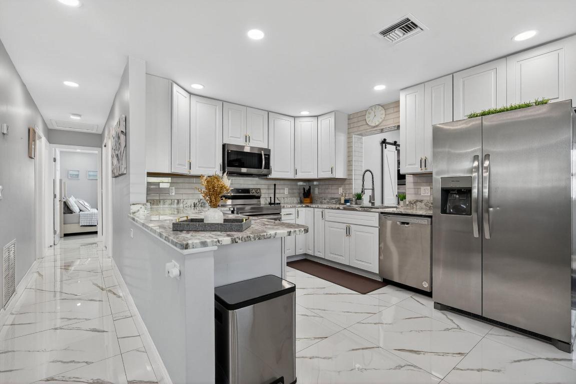 511 Iris, Palm Beach Gardens FL 33410