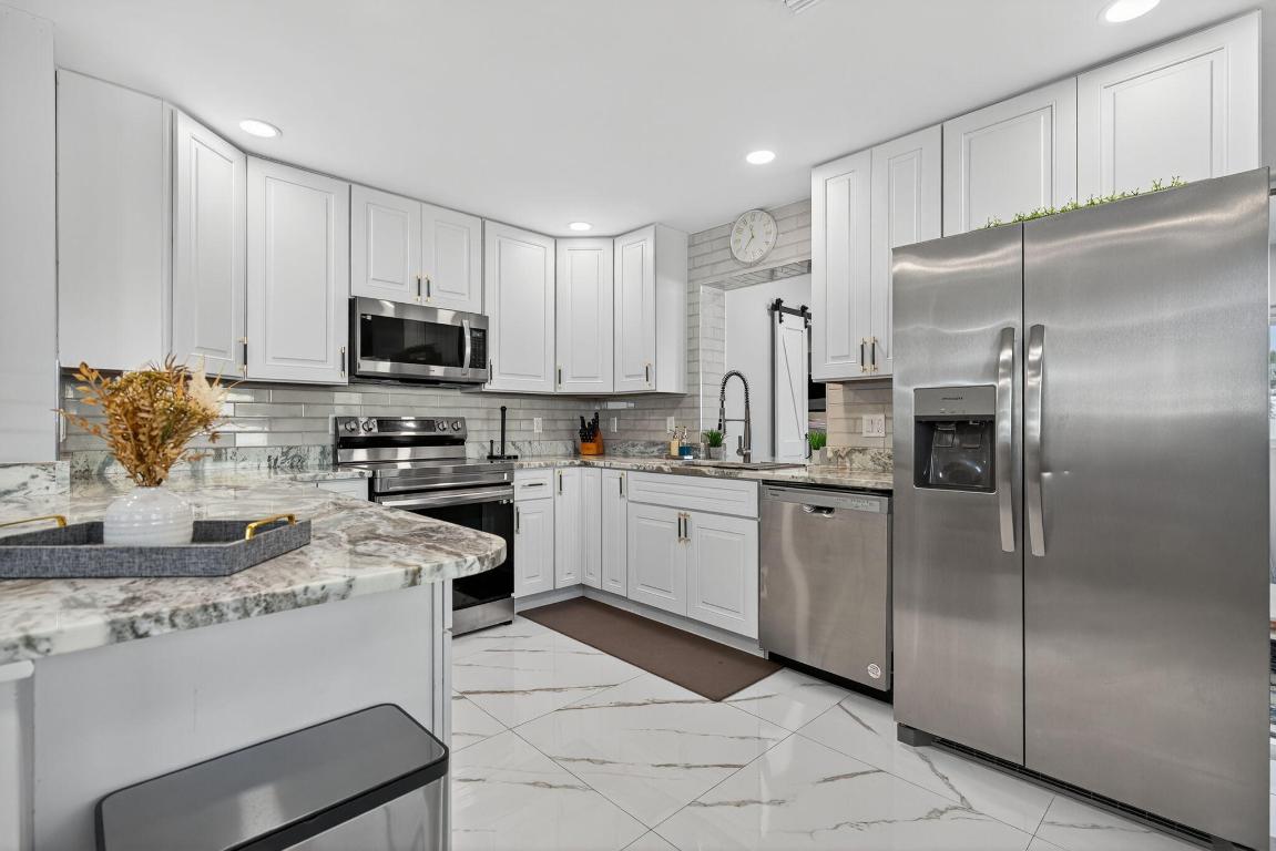 511 Iris, Palm Beach Gardens FL 33410