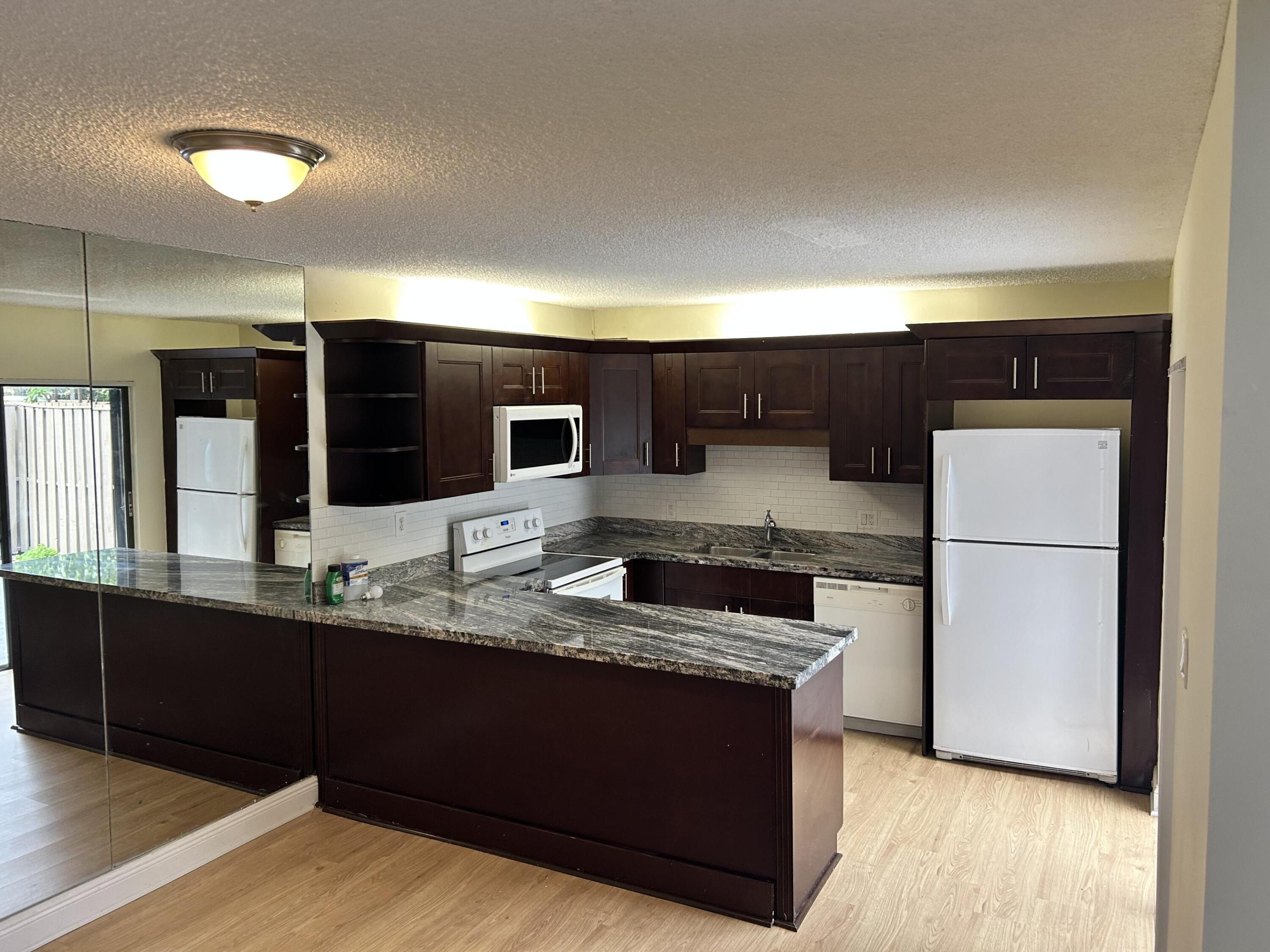 705 7th, Palm Beach Gardens FL 33410