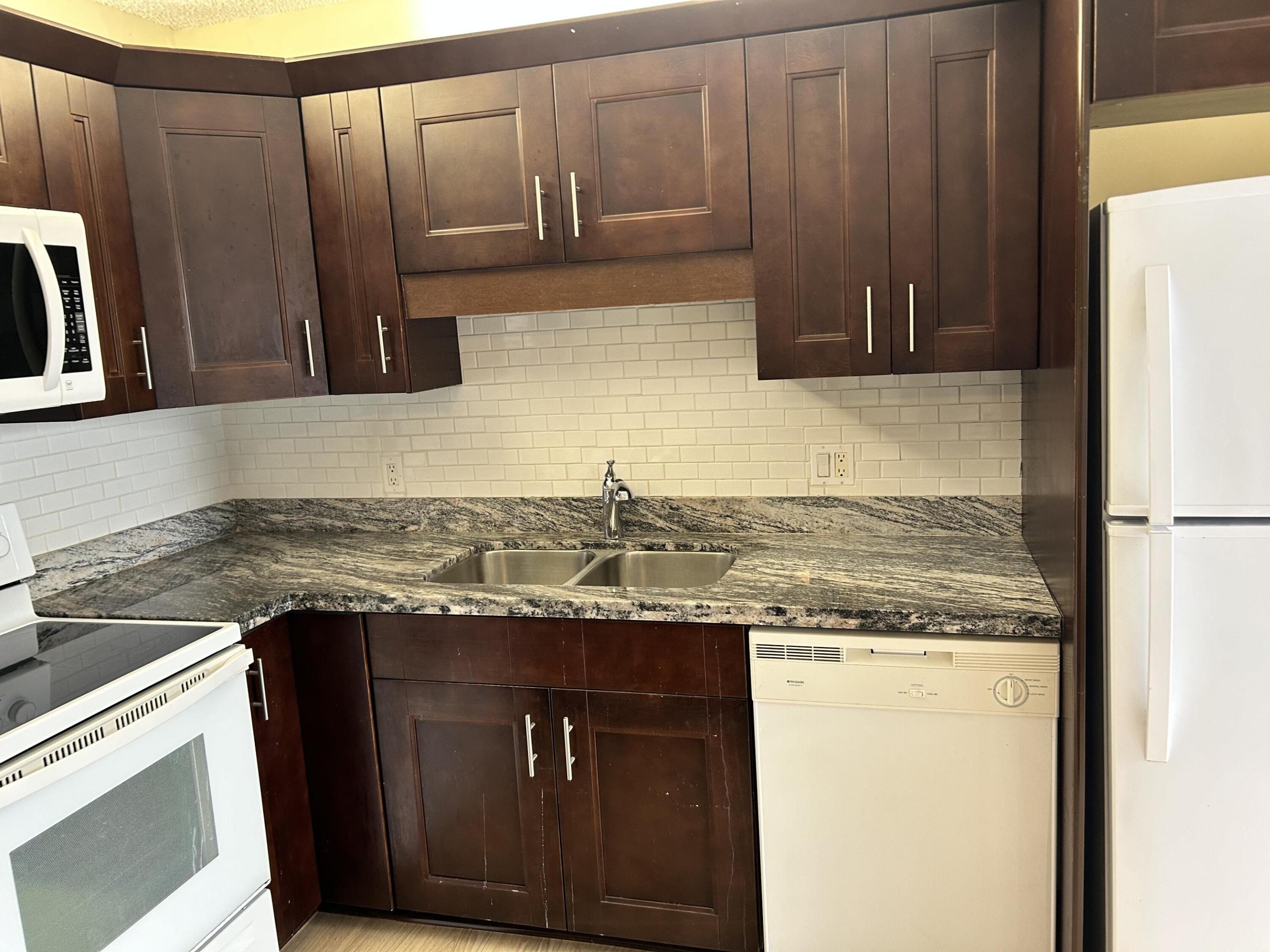 705 7th, Palm Beach Gardens FL 33410
