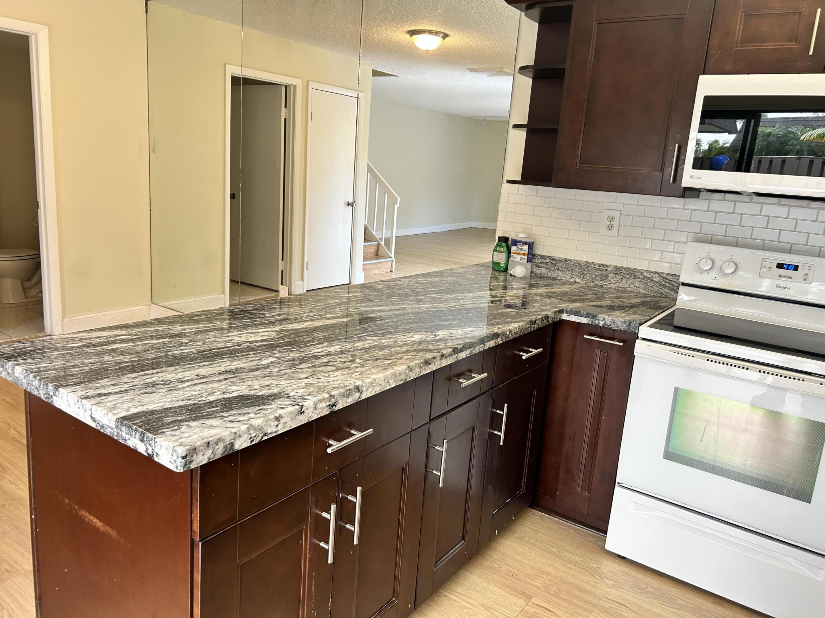 705 7th, Palm Beach Gardens FL 33410